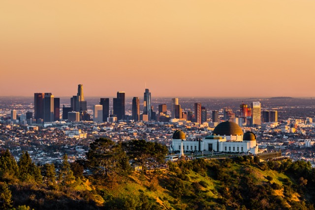 Sunset view of the Los Angeles Skyline and Griffith Park