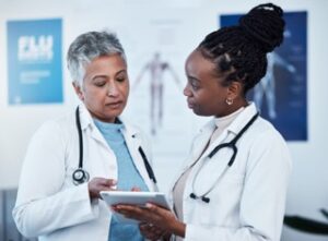 Image of two physicians conversing